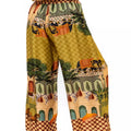 Colorful patterned outfit with wide-leg pants on a white background