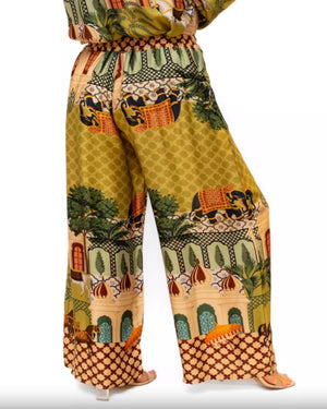 Colorful patterned outfit with wide-leg pants on a white background